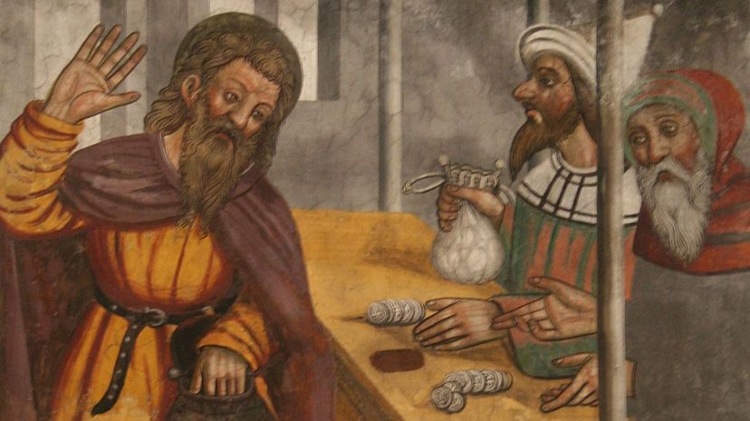 Judas being paid the 30 pieces of silver