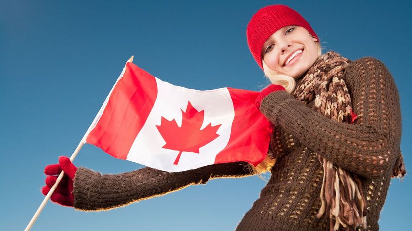 Woman holding Canada flag