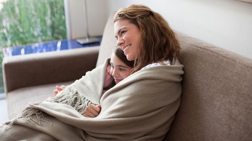 6 Mom and daughter snuggling
