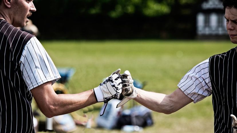 Q15-Baseball Players Fist Bump