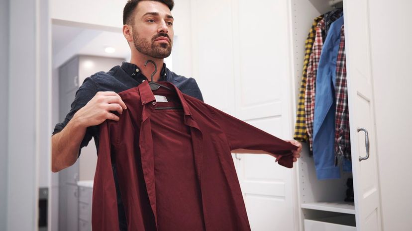 Man Choosing Dress Shirt