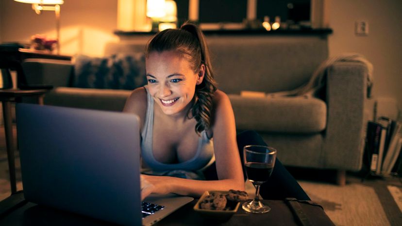 Woman watch movie on laptop