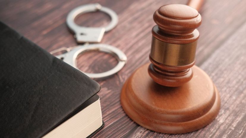 Gavel and law book on desk