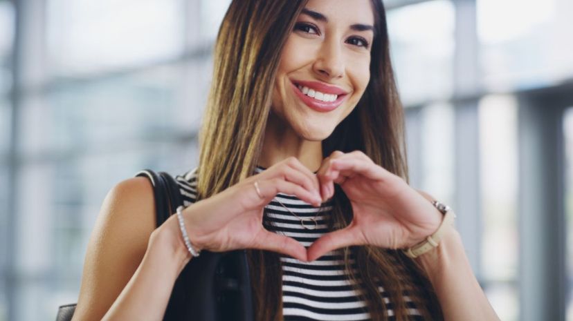Woman showing a heart sign