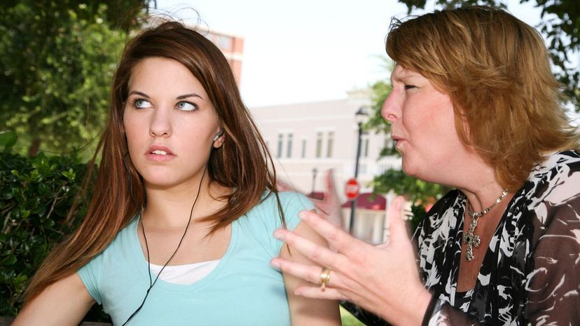 Mother lecturing daughter