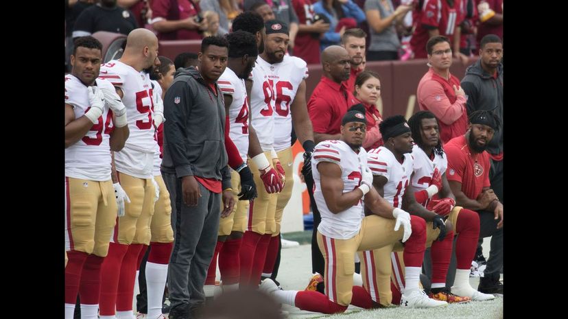 NFL players take a knee