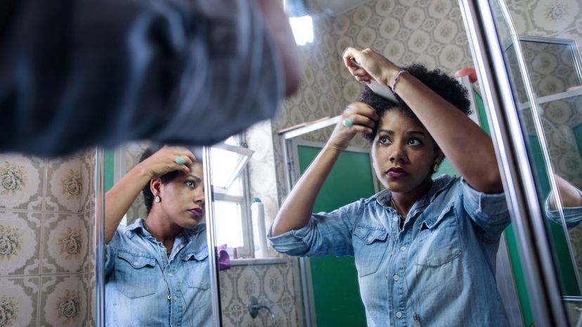 Woman brushing hair