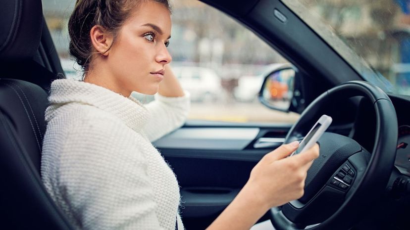 Girl-Texting-in-Car