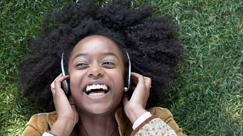 Girl laughing with headphones