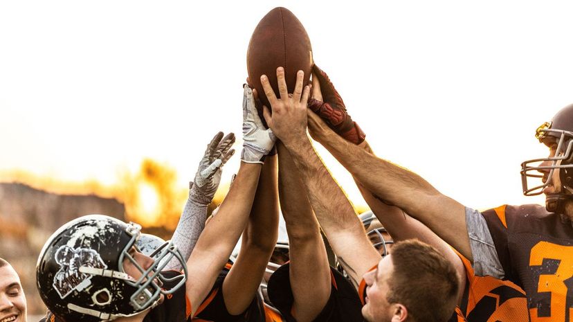 American Football Players Celebrating The Victory