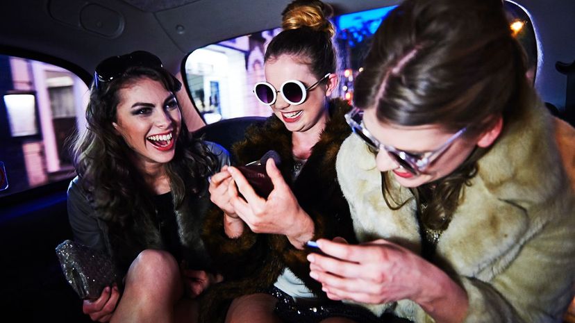 Q3-Women laughing together in taxi