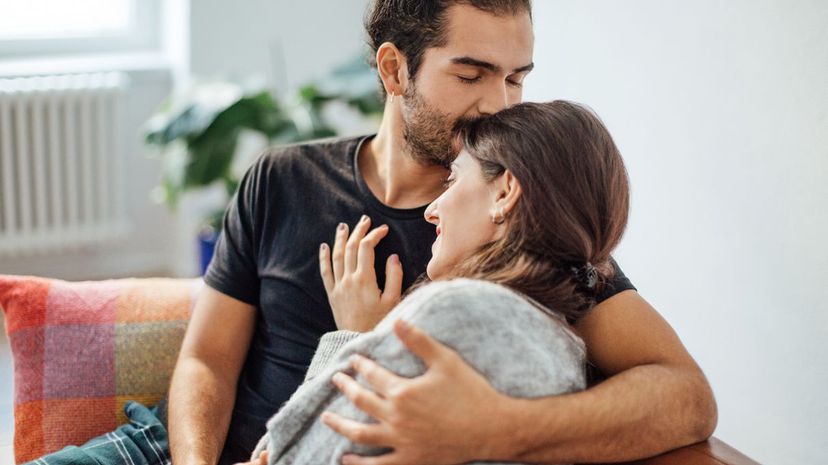 Man Kissing Forehead