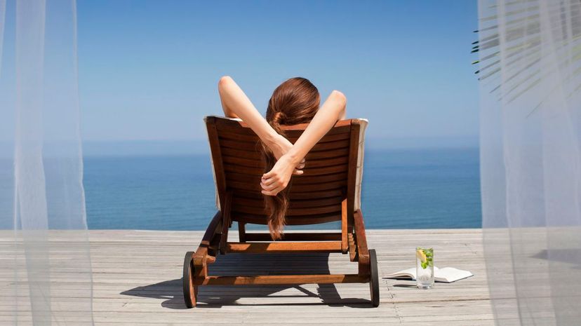 Woman relax on deck chair