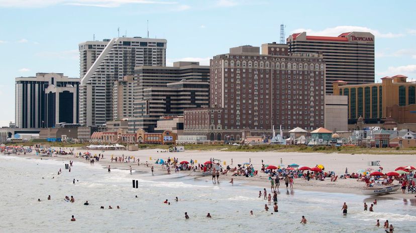 Atlantic City skyline with tourists on the beach