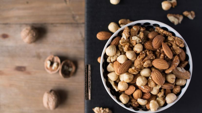 Walnuts, almonds and hazelnuts in a bowl
