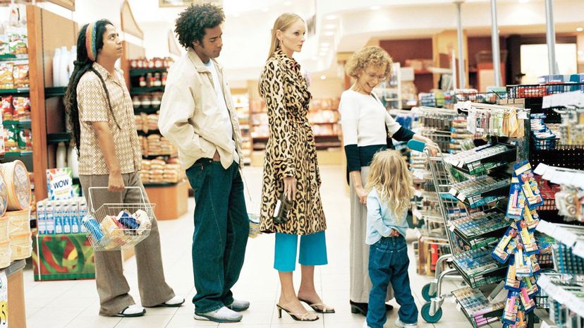 Customers in supermarket queue