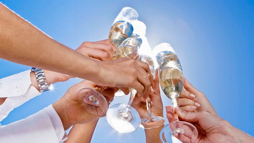 People toasting champagne flutes