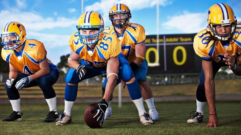 Football players preparing to play football