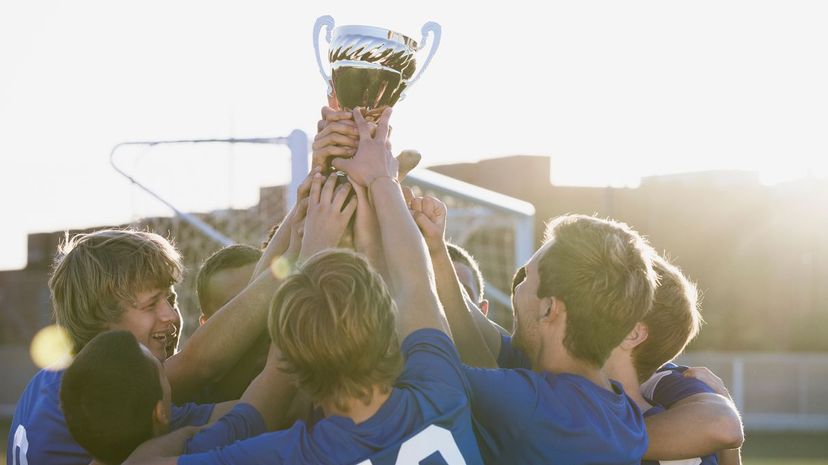 Team holding trophy