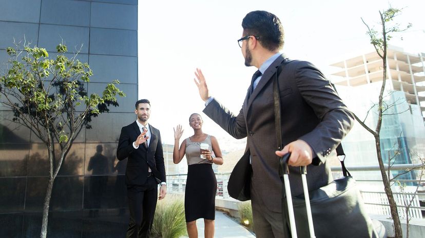 26 Businessman saying goodbye