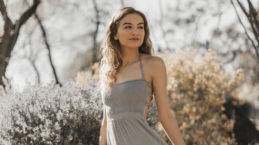 Young woman grey dress