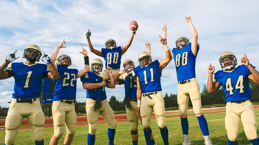 American football team celebrating their victory