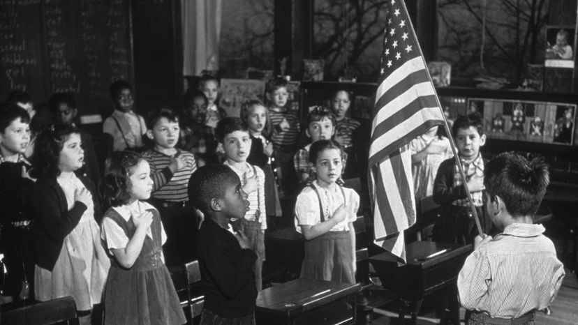 boy and class reciting pledge of allegiance
