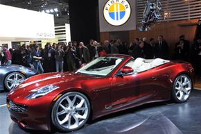 Fisker Automotive在密歇根州底特律的底特律国际汽车展期间展示了业力的插件混合动力车。“border=