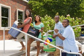 Family helping college student move into dormitory. 