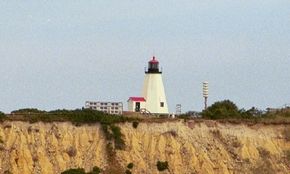 The first Plymouth Light was constructed more than a decade before the Declaration of Independence was signed in Philadelphia. The striking pyramidal shape of the light at Plymouth, a very sturdy form of lighthouse design, can be seen here. See more pictures of lighthouses.