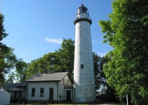 The white conical lighthouse at Point Aux Barques is among the most photographed lighthouses in the Great Lakes region. See more lighthouse pictures.