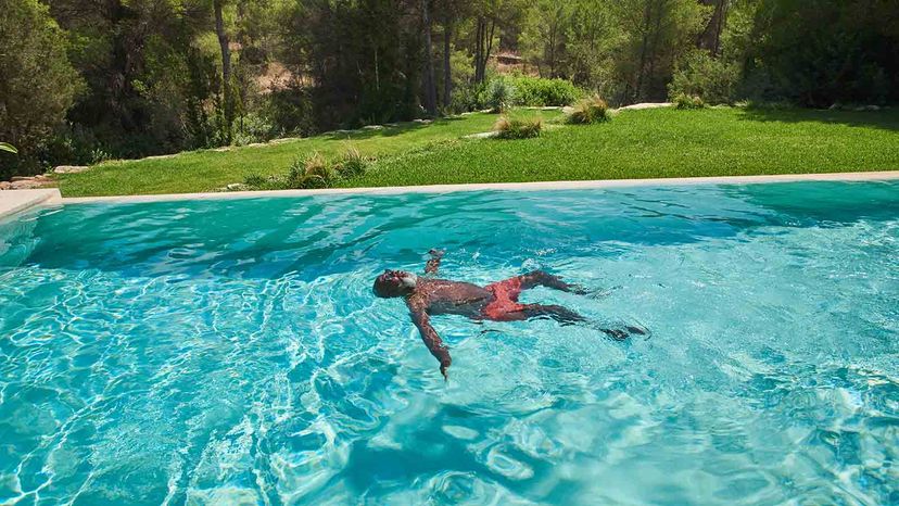 man chilling in pool