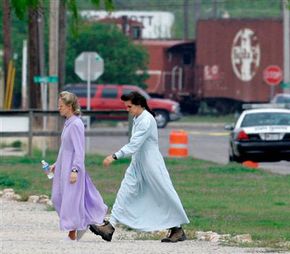 Two members of the polygamist Fundamentalist Church of Jesus Christ of Latter Day Saints in San Angelo, Texas, Wednesday, April 9, 2008.