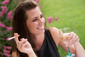 woman smoking wine