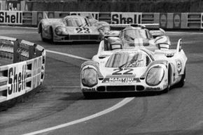 Helmut Marko and Gijs van Lennep pull into the lead in their Porsche 917, at Tertre Rouge during the 24 hour race at Le Mans on June 13, 1971.