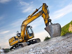 rusty earth mover on work site