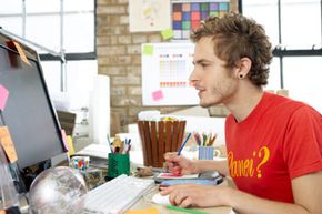 Man working on computer.