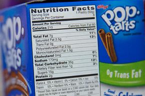 The &quot;nutrition facts&quot; label is seen on a box of Pop Tarts at a store in New York, Feb. 27, 2014. Some companies use all kinds of deceptive practices to make the sugar content of their products look smaller.