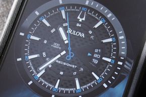 Maybe a cell phone can't replicate the aesthetics of a wristwatch, but in case you'd like to try, Bulova released a free iPhone and iPad clock/alarm app in December 2011 that features six watch face designs, including two Precisionists.