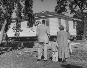 Why do the entry doors to most homes open inward, while in most public  buildings, the entry doors open outward?