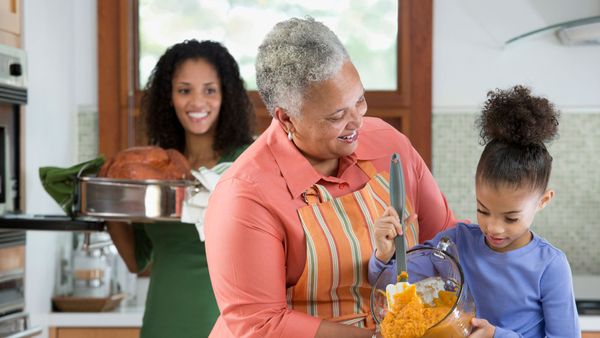 black family three generations preparing for thanksgiving
