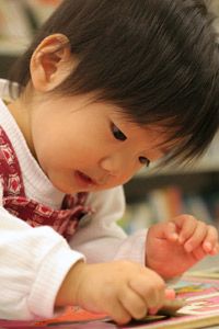 preschooler assembling a puzzle