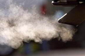 Exhaust billows out of a car tailpipe in San Francisco, Calif.