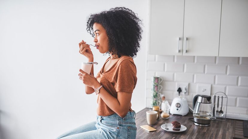 girl eating yogurst