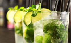 Mojitos made with fresh mint and lime juice