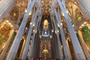 An interior look at the Sagrada Familia cathedral in Barcelona; the site is a popular tourist destination.