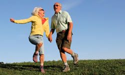 older couple jumping