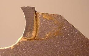 The carbide tip on a typical circular saw.