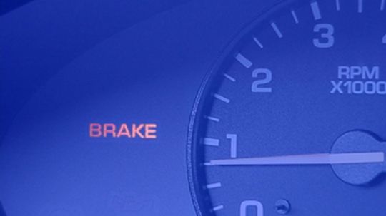 What do the brake warning lights mean in my car?