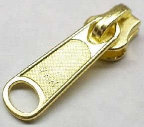 Why do most zippers say &quot;YKK&quot; on the pull-tab?